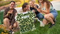 Students laughing, making tie-dye